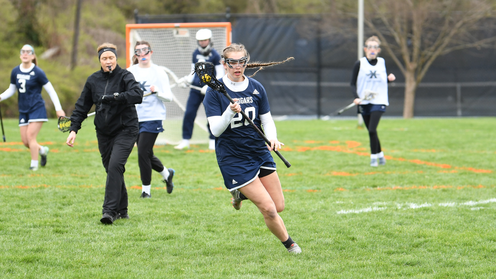 Lady Cougars Fall to Xavier in Final Road Contest
