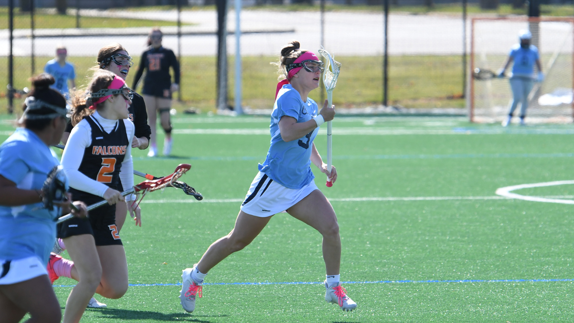 Cougars Split in Michigan