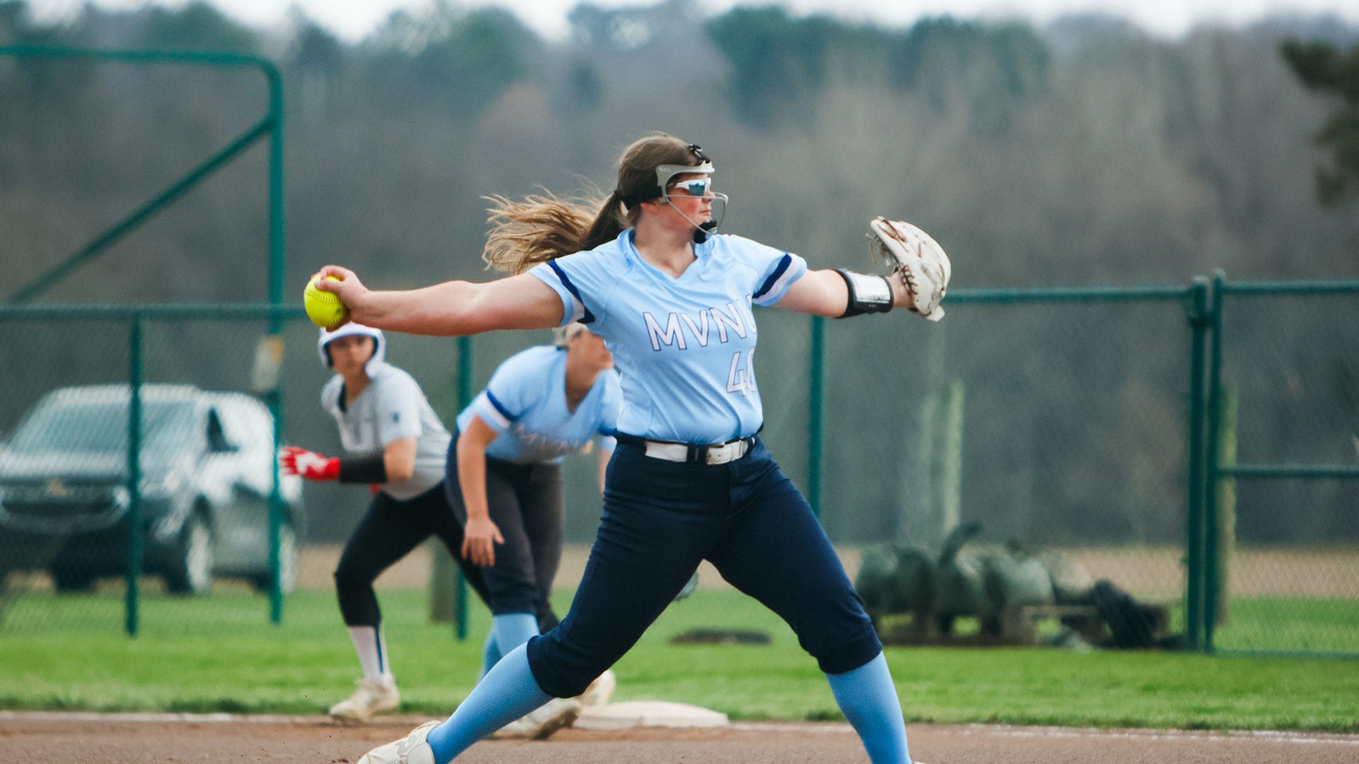 Makenzie Delaney pitching the ball